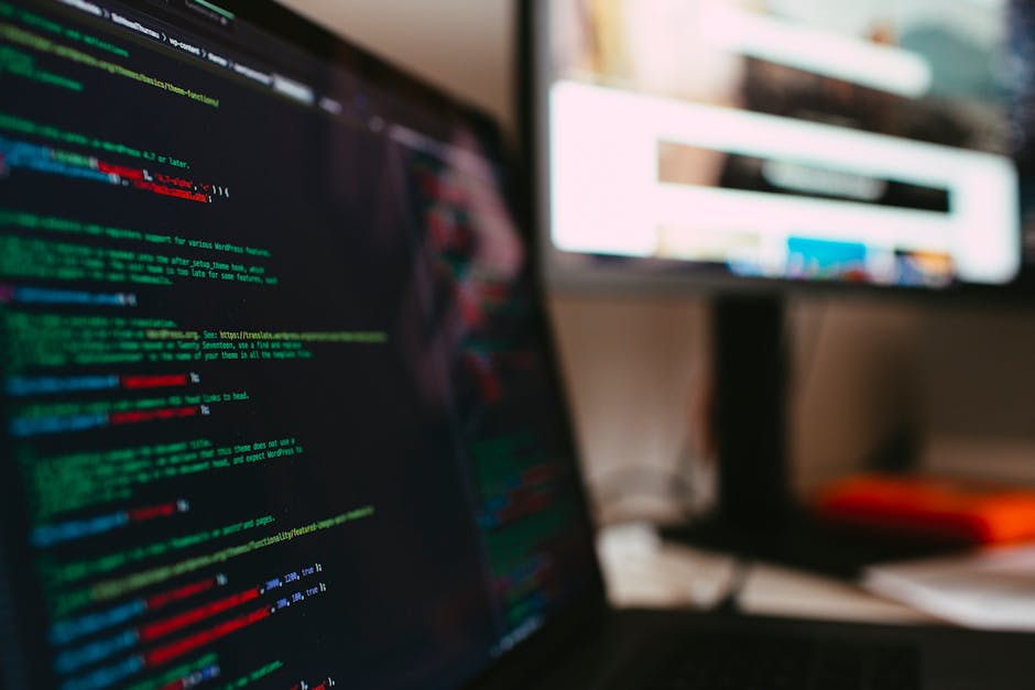 A detailed view of programming code displayed on a laptop screen